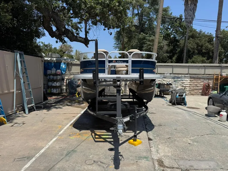 Slide: The Image of 2023 Sun Tracker Bass Buggy 16 XL Select on trailer in outdoor setting. - 27