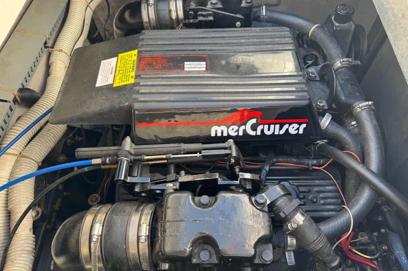 Slide: The Image of Engine compartment of a 1990 Carver 30 Santego with MerCruiser components. - 17
