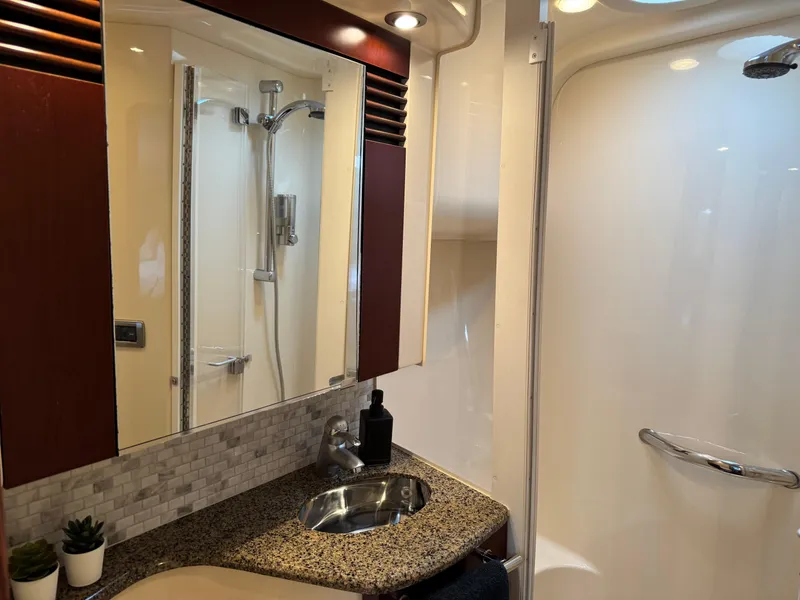 Slide: The Image of Luxurious bathroom interior of 2005 Sea Ray 420 Sedan Bridge yacht. - 21