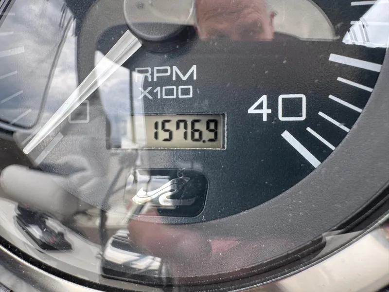 Slide: The Image of Close-up of 2005 Sea Ray 420 Sedan Bridge tachometer showing 1576.9 hours. - 31