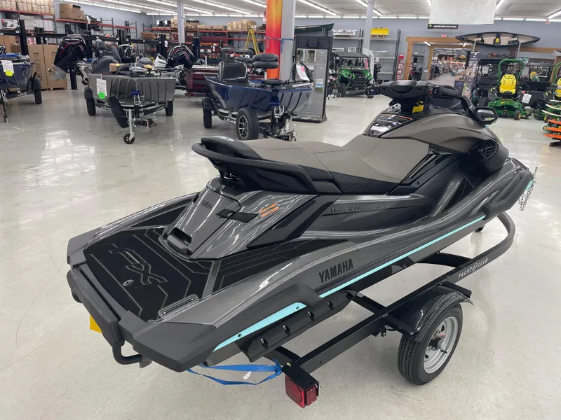 Slide: The Image of 2025 Yamaha WaveRunner FX Cruiser HO displayed in a showroom on a trailer. - 3