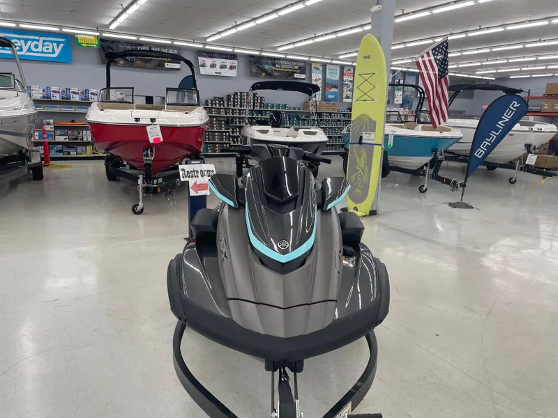 Slide: The Image of 2025 Yamaha WaveRunner FX Cruiser HO displayed in a showroom with boats and accessories. - 6