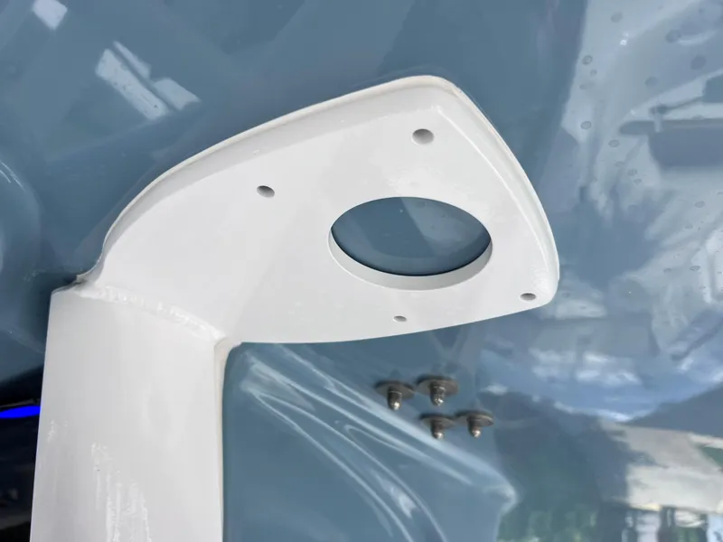 Slide: The Image of Close-up of 2024 Sea Hunt Ultra 239 SE boat component with mounting holes. - 48