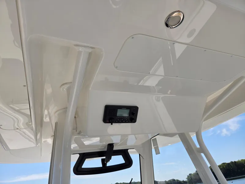 Slide: The Image of 2021 Regulator 31 CC boat interior ceiling with electronic panel. - 11