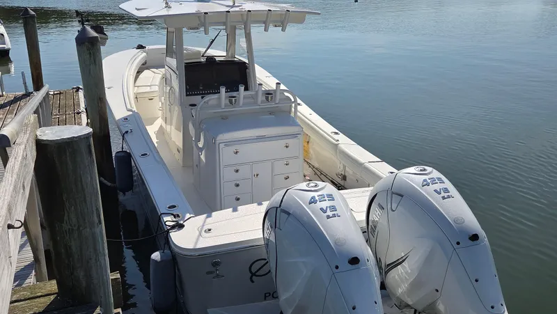 Slide: The Image of 2021 Regulator 31 CC boat docked with twin 425 V8 engines. - 7