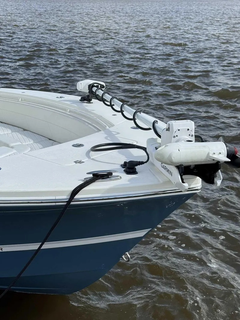 Slide: The Image of 2023 Regulator 30XO boat with Garmin equipment on water. - 11