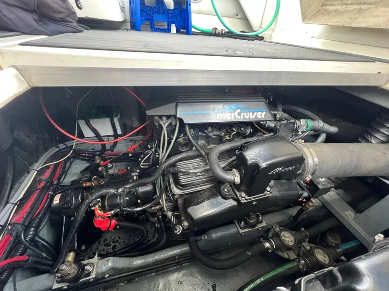 Slide: The Image of Engine compartment of a 1991 Sea Ray 310 Sundancer with MerCruiser engine. - 25