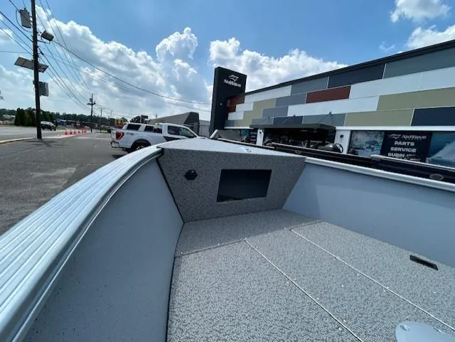 Slide: The Image of 2026 Lund 1600 Fury Tiller boat at dealership, showcasing interior and exterior design. - 9