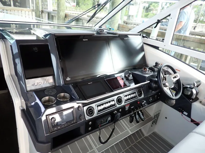 Slide: The Image of 2020 Formula 430 Super Sport Crossover helm with advanced navigation and control systems. - 22