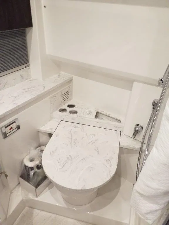 Slide: The Image of Luxurious bathroom in 2020 Formula 430 Super Sport Crossover yacht with marble accents. - 4