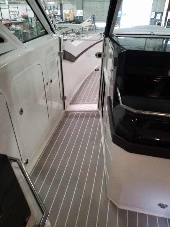 Slide: The Image of 2020 Formula 430 Super Sport Crossover boat interior with sleek design and modern features. - 9