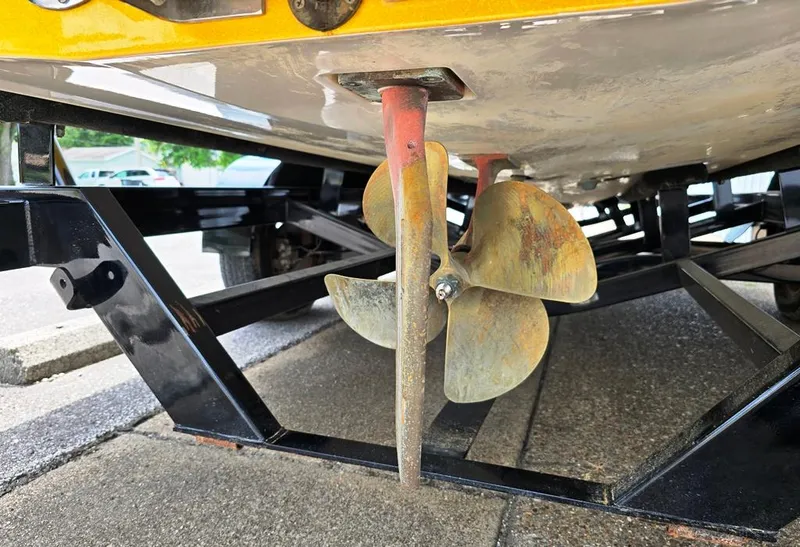 Slide: The Image of Propeller of a 2015 Malibu Wakesetter 22 VLX Surf Gate on a trailer. - 10