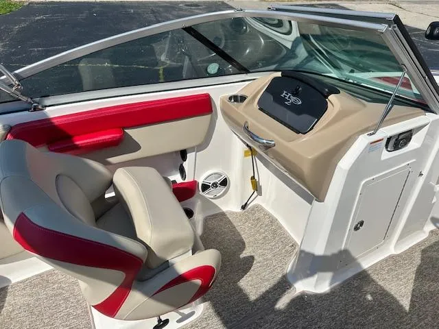 Slide: The Image of 2018 Chaparral 21 H2O Ski & Fish boat interior with red and beige seating. - 20