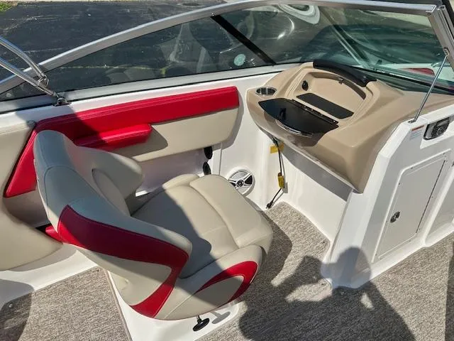 Slide: The Image of 2018 Chaparral 21 H2O Ski & Fish boat interior with red and beige seating. - 21