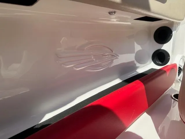 Slide: The Image of 2018 Chaparral 21 H2O Ski & Fish boat interior with red and white design. - 23