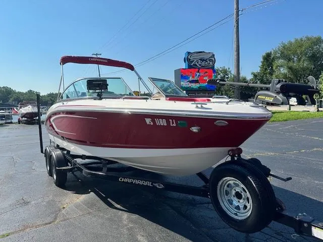 Slide: The Image of 2018 Chaparral 21 H2O Ski & Fish boat on trailer, red and white exterior. - 4