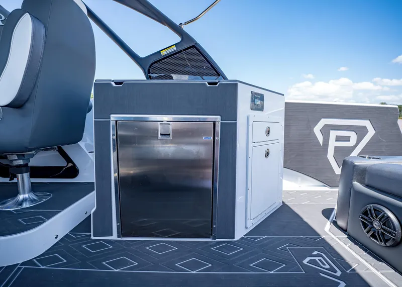 Slide: The Image of 2025 Paradigm Damascus 266 Surf boat interior with sleek seating and modern amenities. - 13