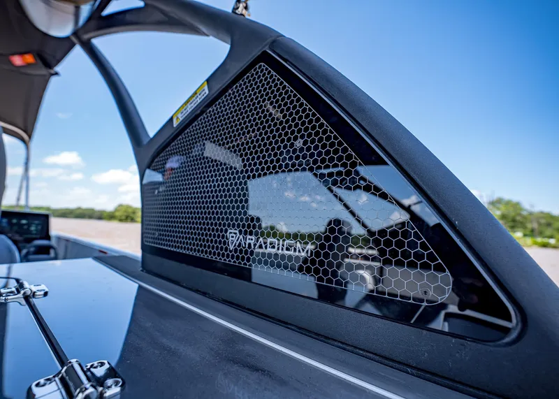 Slide: The Image of 2025 Paradigm Damascus 266 Surf boat with sleek design and hexagonal mesh detail. - 14