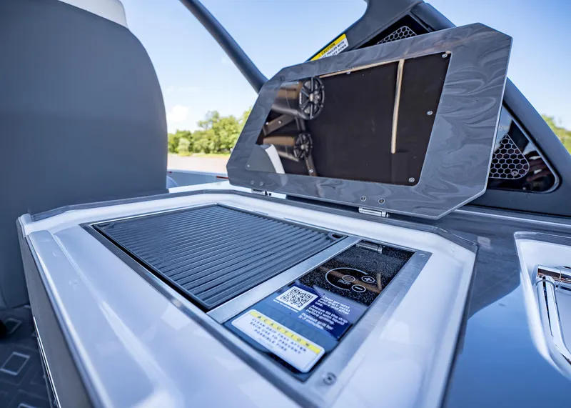 Slide: The Image of 2025 Paradigm Damascus 266 Surf boat interior with control panel and display screen. - 15
