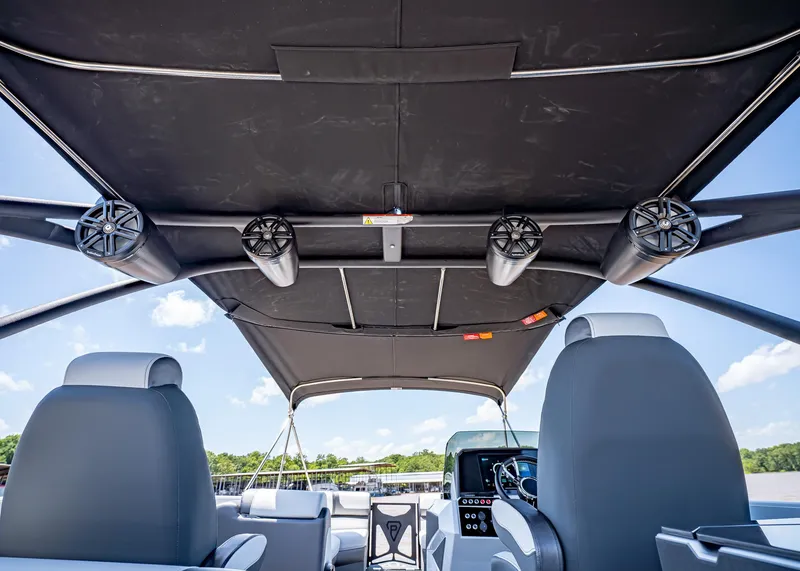 Slide: The Image of 2025 Paradigm Damascus 266 Surf boat interior with speakers and canopy. - 29