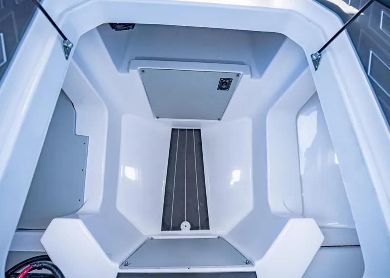 Slide: The Image of Interior view of 2025 Paradigm Damascus 266 Surf boat storage compartment. - 38