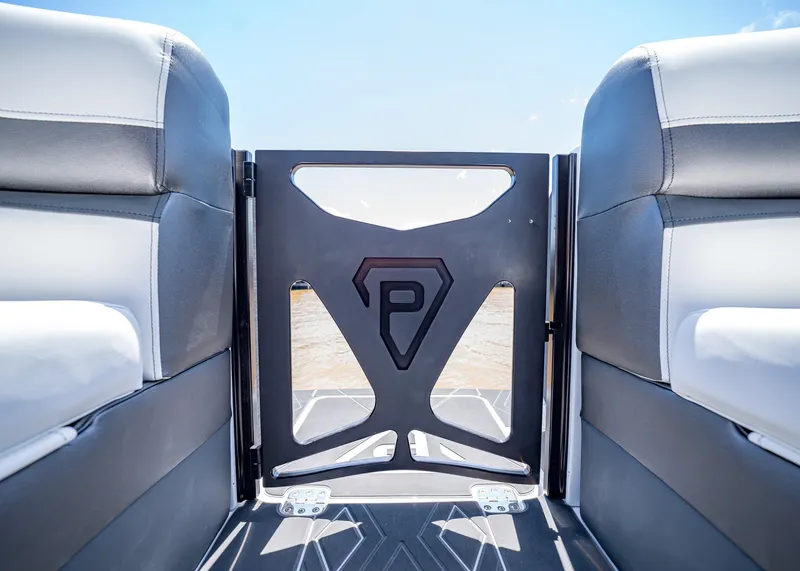 Slide: The Image of 2025 Paradigm Damascus 266 Surf boat interior with stylish seating and logo. - 42