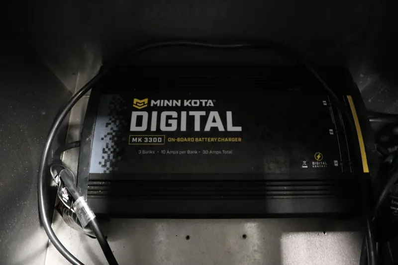 Slide: The Image of Minn Kota MK 3300 digital on-board battery charger in 2024 Crestliner 1950 Fish Hawk WT. - 29