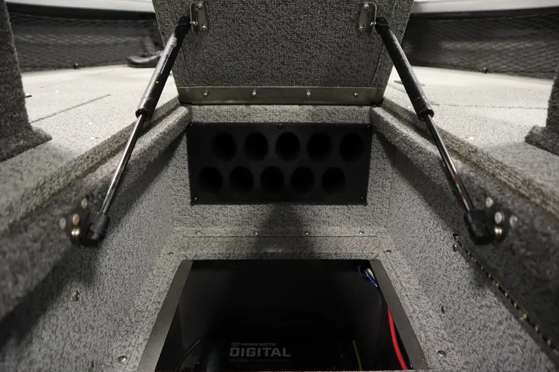 Slide: The Image of 2024 Crestliner 1950 Fish Hawk WT storage compartment with hydraulic lift supports. - 30