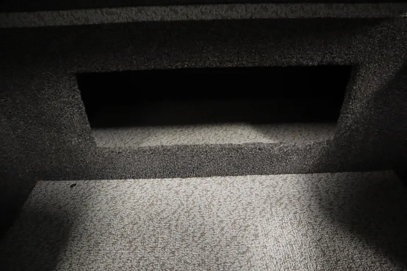 Slide: The Image of Carpeted storage compartment in 2024 Crestliner 1950 Fish Hawk WT boat. - 46