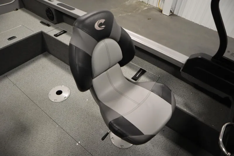 Slide: The Image of 2024 Crestliner 1950 Fish Hawk WT boat seat, gray and black design, interior view. - 47