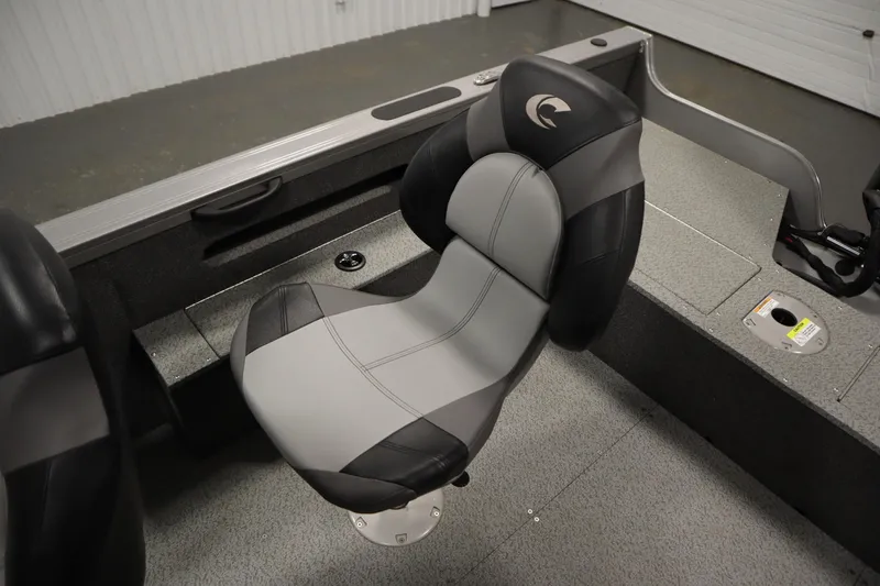 Slide: The Image of 2024 Crestliner 1950 Fish Hawk WT boat seat, gray and black design, interior view. - 48