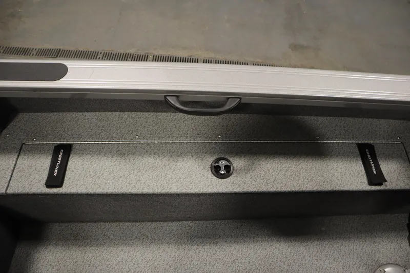 Slide: The Image of 2024 Crestliner 1950 Fish Hawk WT interior storage compartment with textured finish. - 49