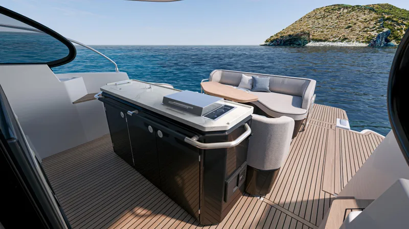 Slide: The Image of Luxury deck of 2026 Beneteau Gran Turismo 40 yacht with seating and ocean view. - 8