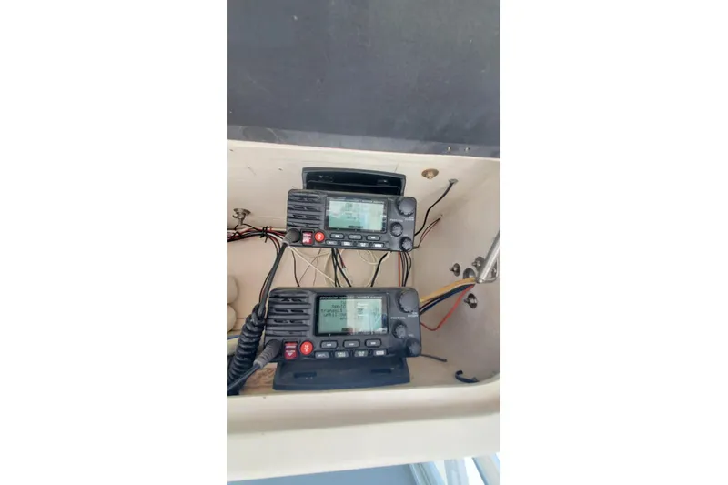 Slide: The Image of Dual marine radios in Ocean Master 31 Center Console, 1998 model. - 21