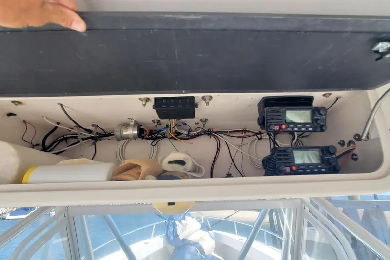 Slide: The Image of Interior view of a 1998 Ocean Master 31 Center Console boat's electronic compartment. - 25