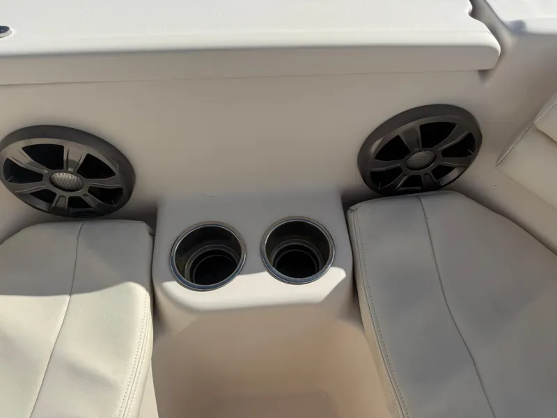 Slide: The Image of Interior of 2020 Grady-White Freedom 192 boat with cup holders and speakers. - 17