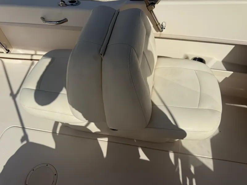 Slide: The Image of White leather seat on 2020 Grady-White Freedom 192 boat. - 20
