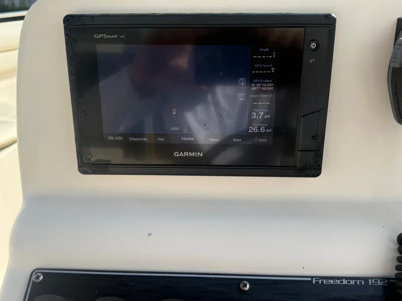 Slide: The Image of Garmin GPS display on 2020 Grady-White Freedom 192 boat dashboard. - 28