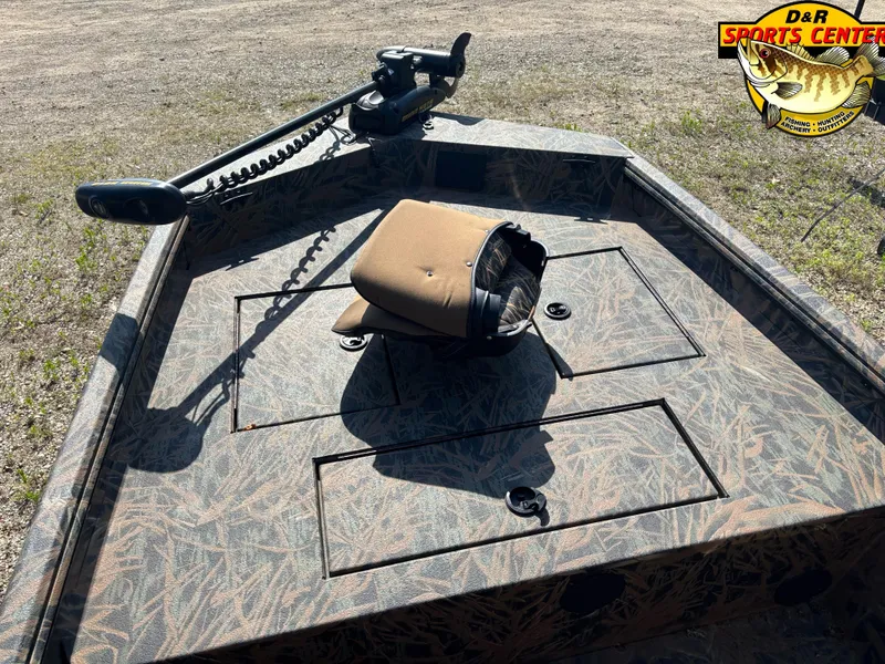 Slide: The Image of 2016 Ranger 1760 MPV boat deck with trolling motor and camo pattern. - 3