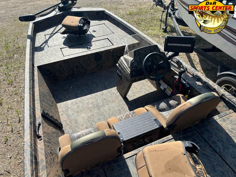 Slide: The Image of 2016 Ranger 1760 MPV boat interior with camouflage design and fishing equipment. - 8