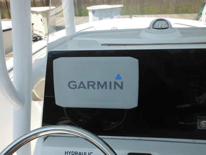 Slide: The Image of Garmin navigation system on 2022 Tidewater 220 LXF boat dashboard. - 23