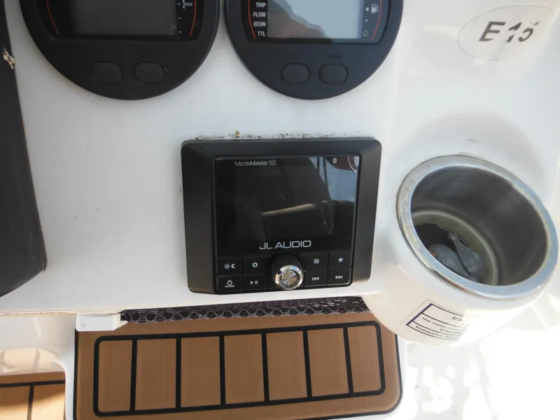 Slide: The Image of Control panel of a 2022 Tidewater 220 LXF boat with JL Audio system. - 26