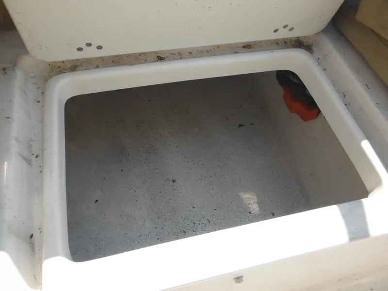 Slide: The Image of Open storage compartment in 2022 Tidewater 220 LXF boat. - 32