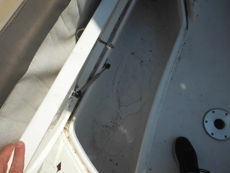 Slide: The Image of Interior view of a 2022 Tidewater 220 LXF boat showing storage compartment. - 38
