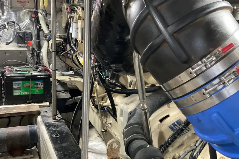 Slide: The Image of Engine room of 2000 Carver 530 Voyager Pilothouse with visible deep cycle battery. - 23