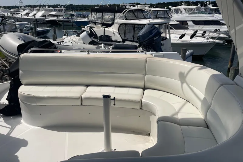 Slide: The Image of Luxurious seating on 2000 Carver 530 Voyager Pilothouse yacht, docked at marina. - 28