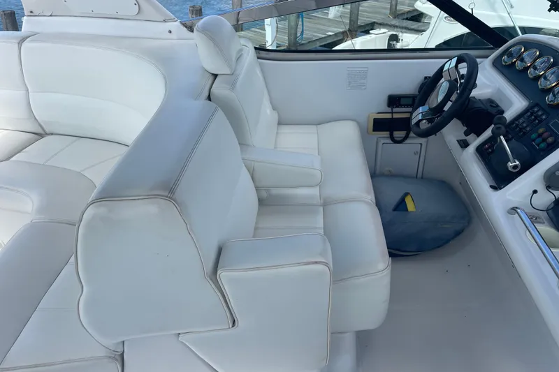 Slide: The Image of Luxurious white seating and control panel on 2000 Carver 530 Voyager Pilothouse yacht. - 30