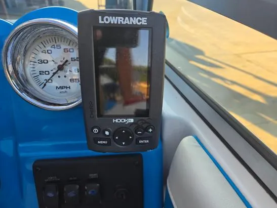 Slide: The Image of Dashboard of a 2015 Bryant Sportabout featuring a Lowrance GPS and speedometer. - 4