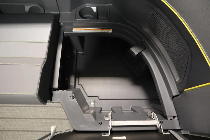 Slide: The Image of Interior storage compartment of 2025 Manitou 24 Explore Switchback Trifold Tritoon boat. - 15