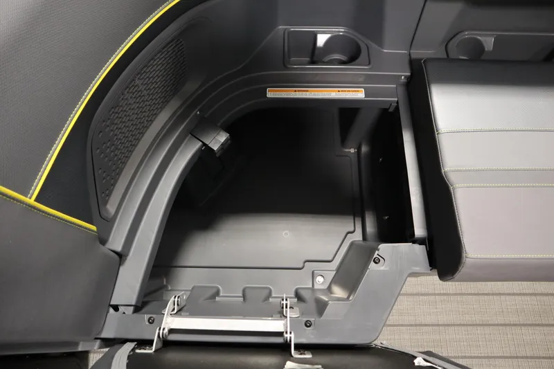 Slide: The Image of Storage compartment in 2025 Manitou 24 Explore Switchback Trifold Tritoon boat. - 19